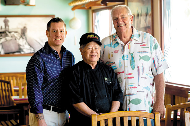 Director of restaurant operations Brian McKelvey, executive chef Geoff Arakawa and owner Bruce Johnson